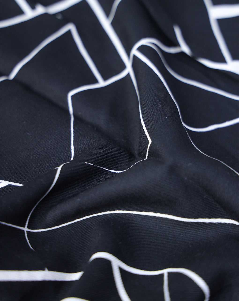 BLACK ABSTRACT DESIGN PRINTED RAYON FABRIC