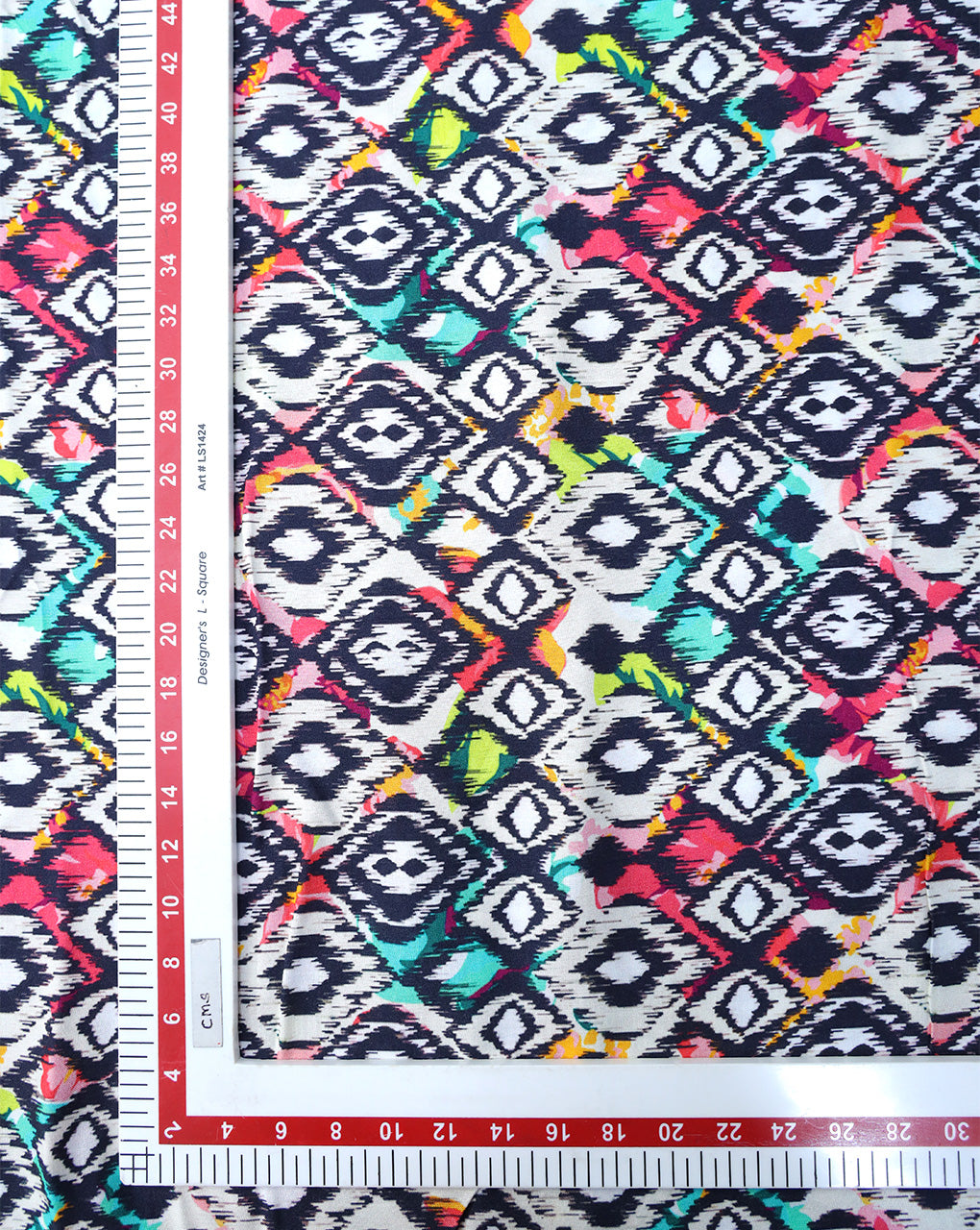 MULTICOLOR ABSTRACT DESIGN PRINTED RAYON FABRIC